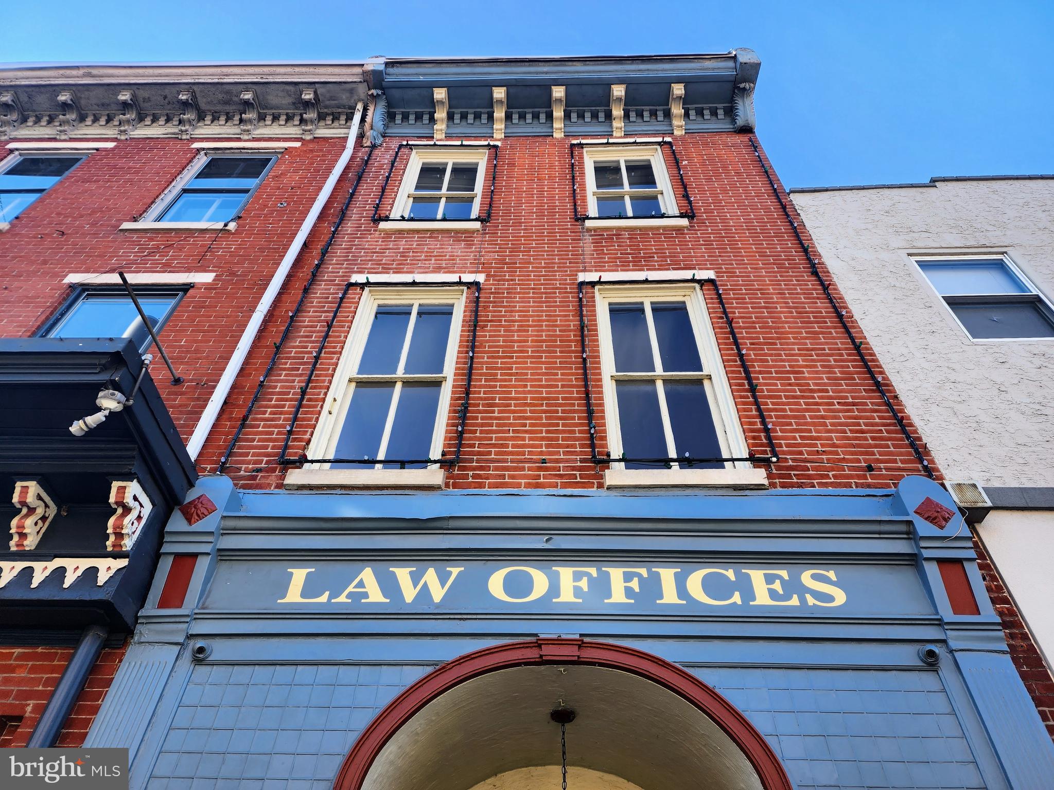 a view of a building with a door and balcony