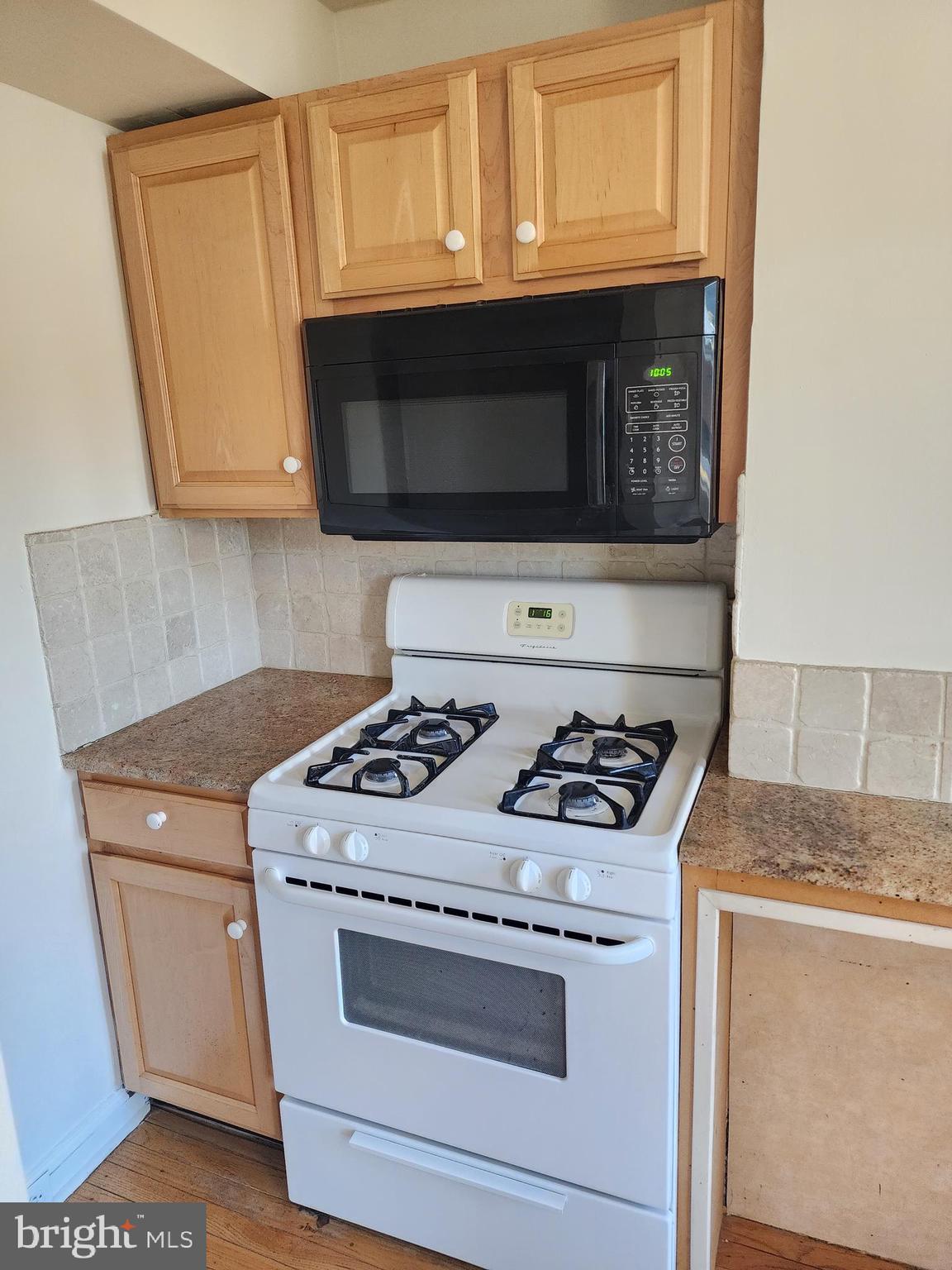 4322 Main Street, Unit 2 Philadelphia, PA 19127 - Photo 15 of 27 a stove top oven sitting inside of a kitchen