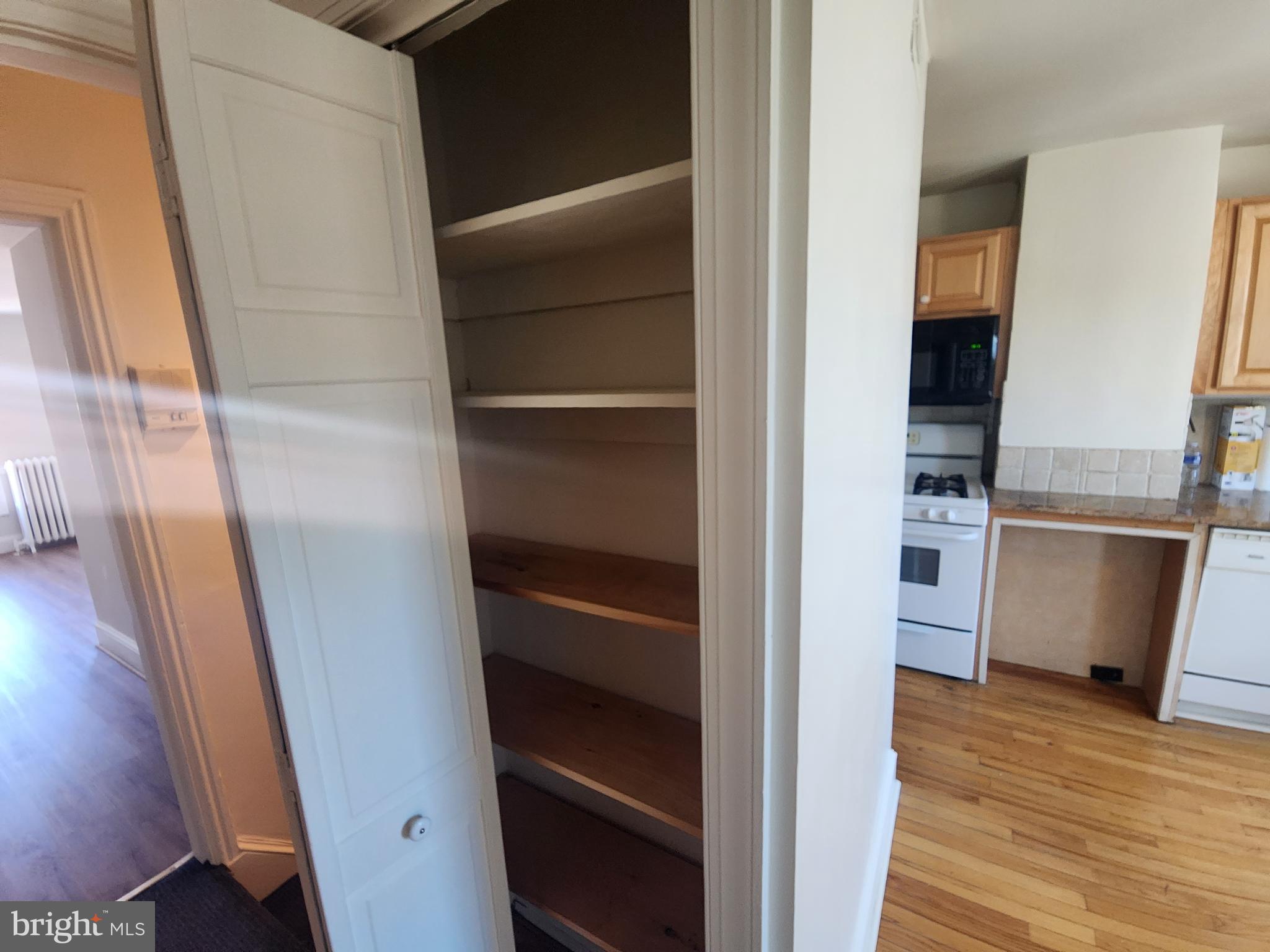 4322 Main Street, Unit 2 Philadelphia, PA 19127 - Photo 21 of 27 a view of a kitchen from a hallway
