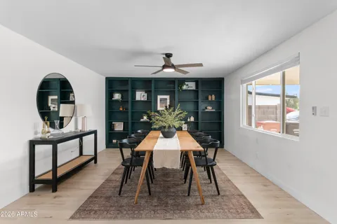a view of a dining room with furniture