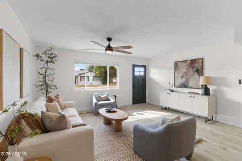 front view of a house with a yard