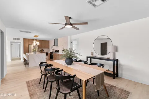 a large kitchen with cabinets a sink and appliances