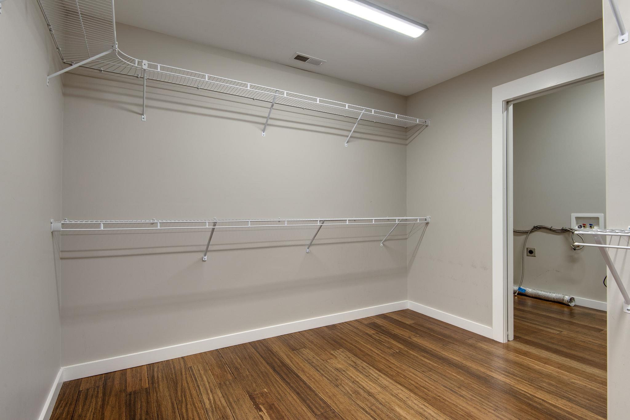 11494 Patterson Road Rockvale, TN 37153 - Photo 15 of 30 Walk in closet in the master bedroom with sliding pocket door leading to the laundry room