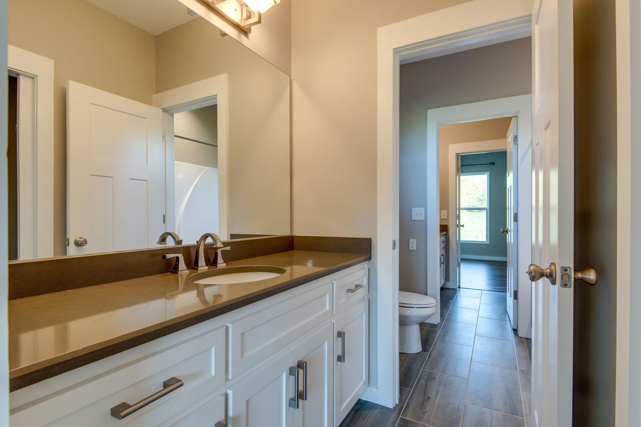 11494 Patterson Road Rockvale, TN 37153 - Photo 17 of 30 Attached bath between front & back bedrooms with their own vanity and walk in closet