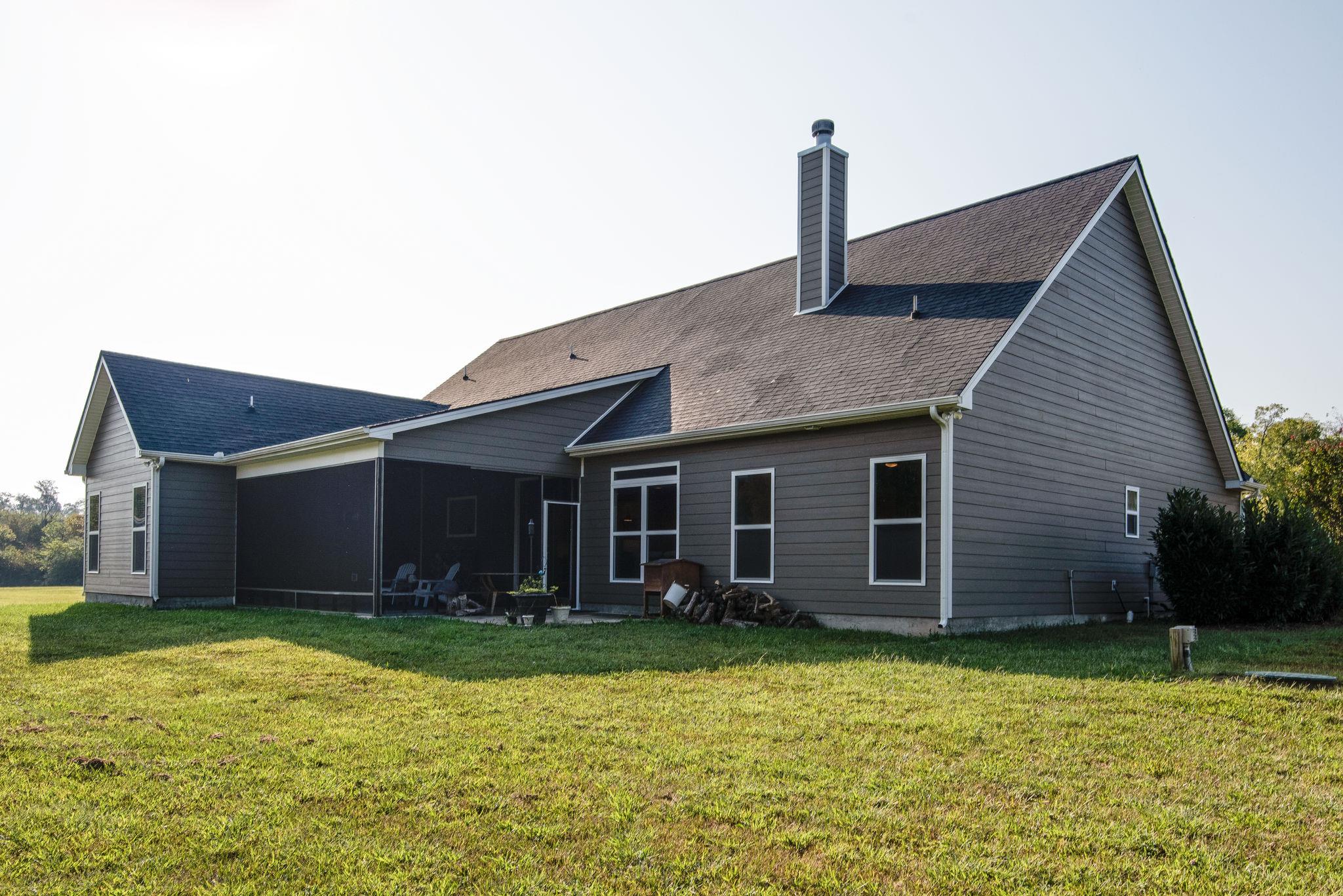 11494 Patterson Road Rockvale, TN 37153 - Photo 27 of 30 view of the back of the house and screened in porch