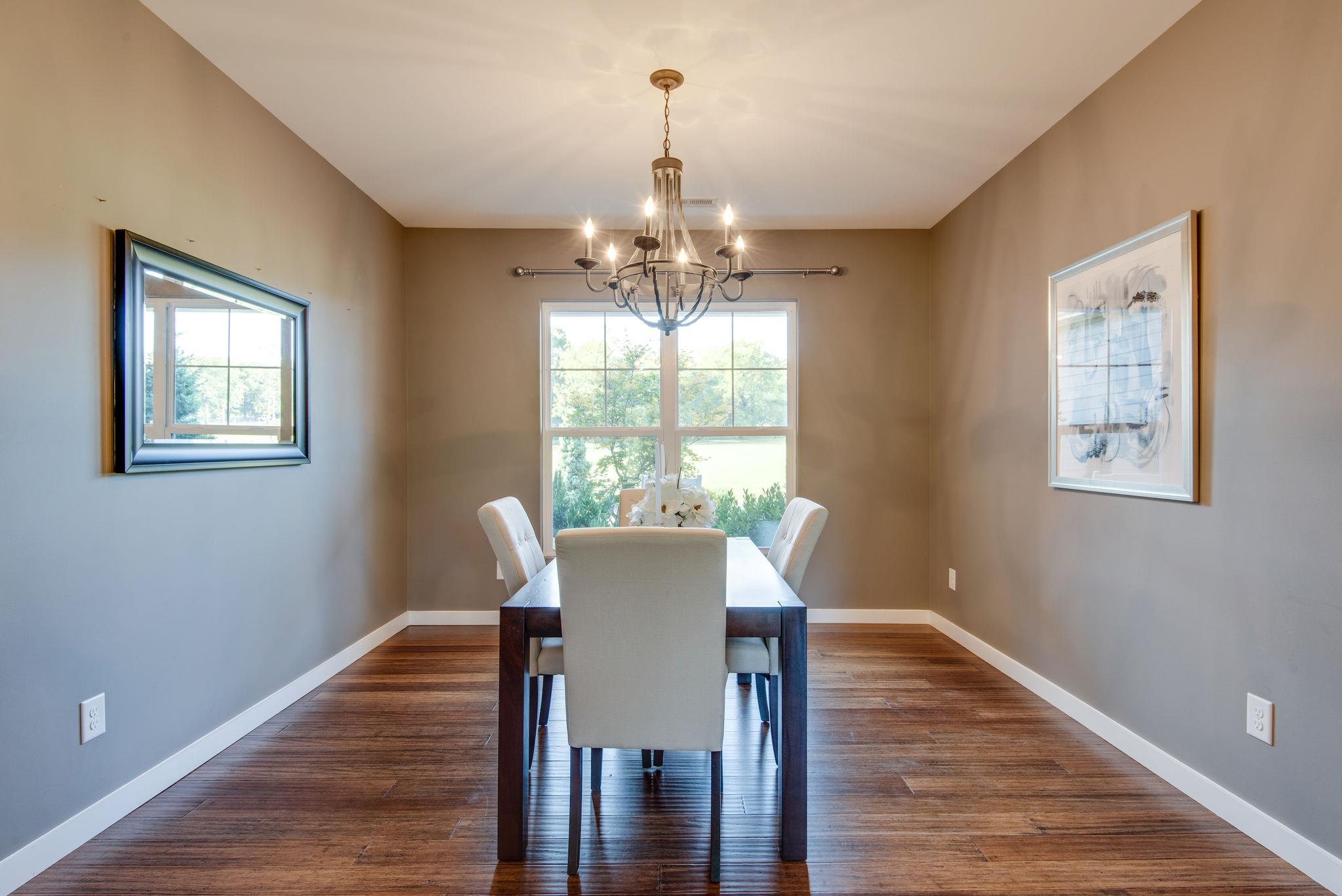 11494 Patterson Road Rockvale, TN 37153 - Photo 8 of 30 Formal dining room attached to the open kitchen and living room complete with hardwood floors