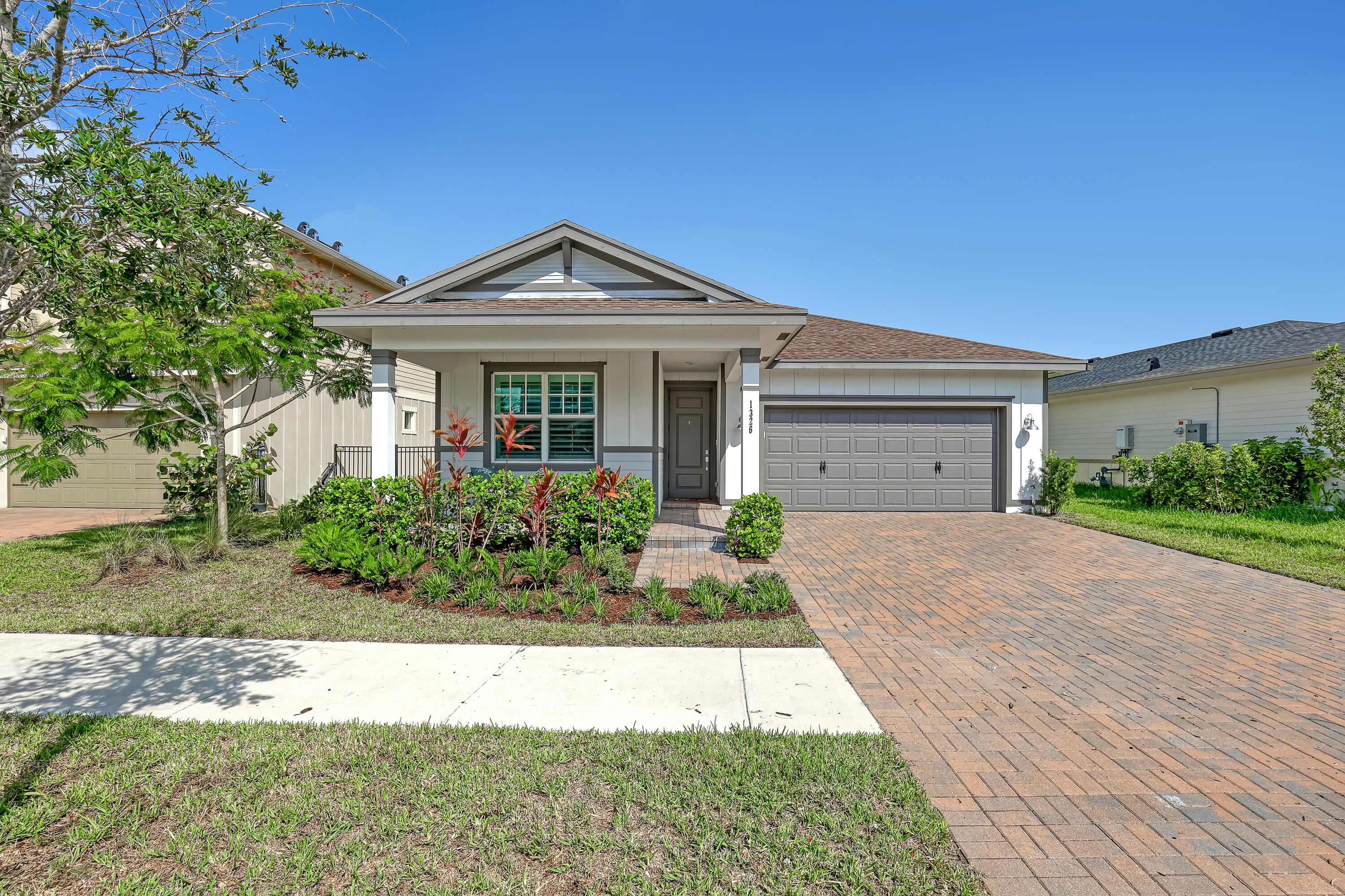 1326 Arrowhead Point Road Loxahatchee, FL 33470 - Photo 2 of 38 5a52850f-b2ce-4947-973d-e29d8ae97897