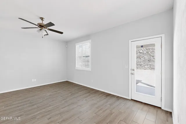 a kitchen with a sink cabinets and stainless steel appliances