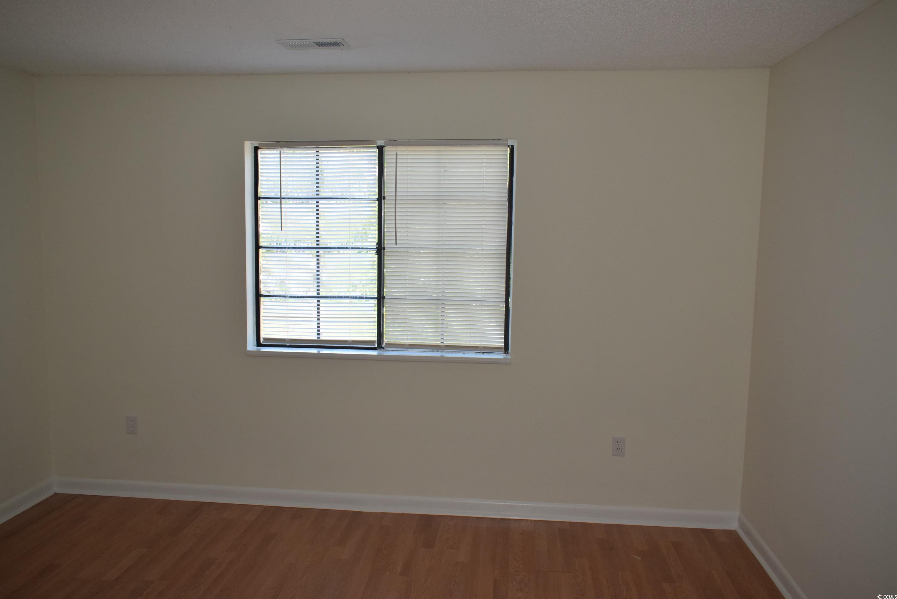 1208 Pinegrove Drive, Unit H Myrtle Beach, SC 29577 - Photo 17 of 18 Washroom featuring light tile patterned floors and washing machine and clothes dryer