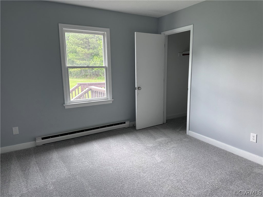 7300 Willson Road Henrico, VA 23231 - Photo 8 of 13 an empty room with windows and closet