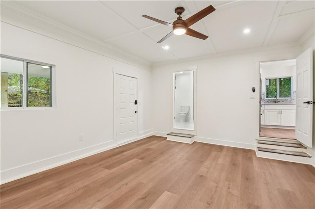 24 McClure Road Temple, GA 30179 - Photo 17 of 41 a view of empty room with wooden floor and fan