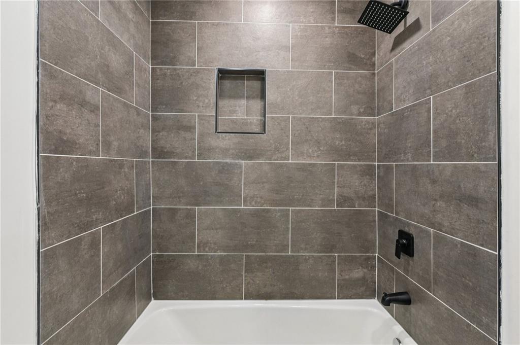 24 McClure Road Temple, GA 30179 - Photo 20 of 41 a bathroom with a shower