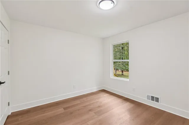 a bath room with a sink and a bath tub