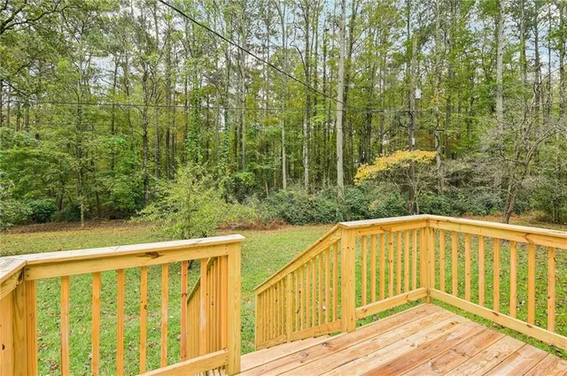 a view of a field with a tree