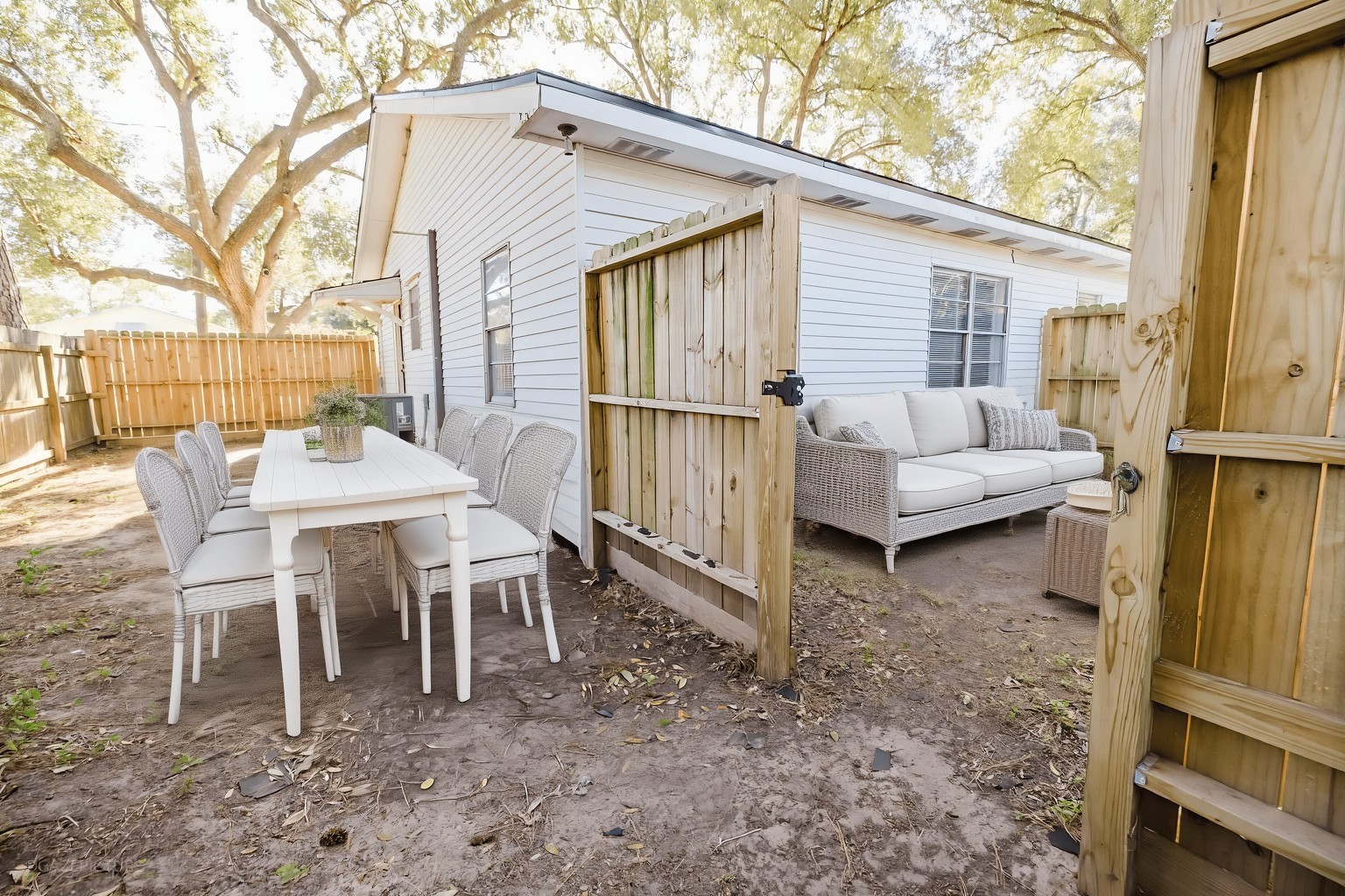 2518 Daugherty Street Waller, TX 77484 - Photo 21 of 32 a backyard of a house with a table and chairs