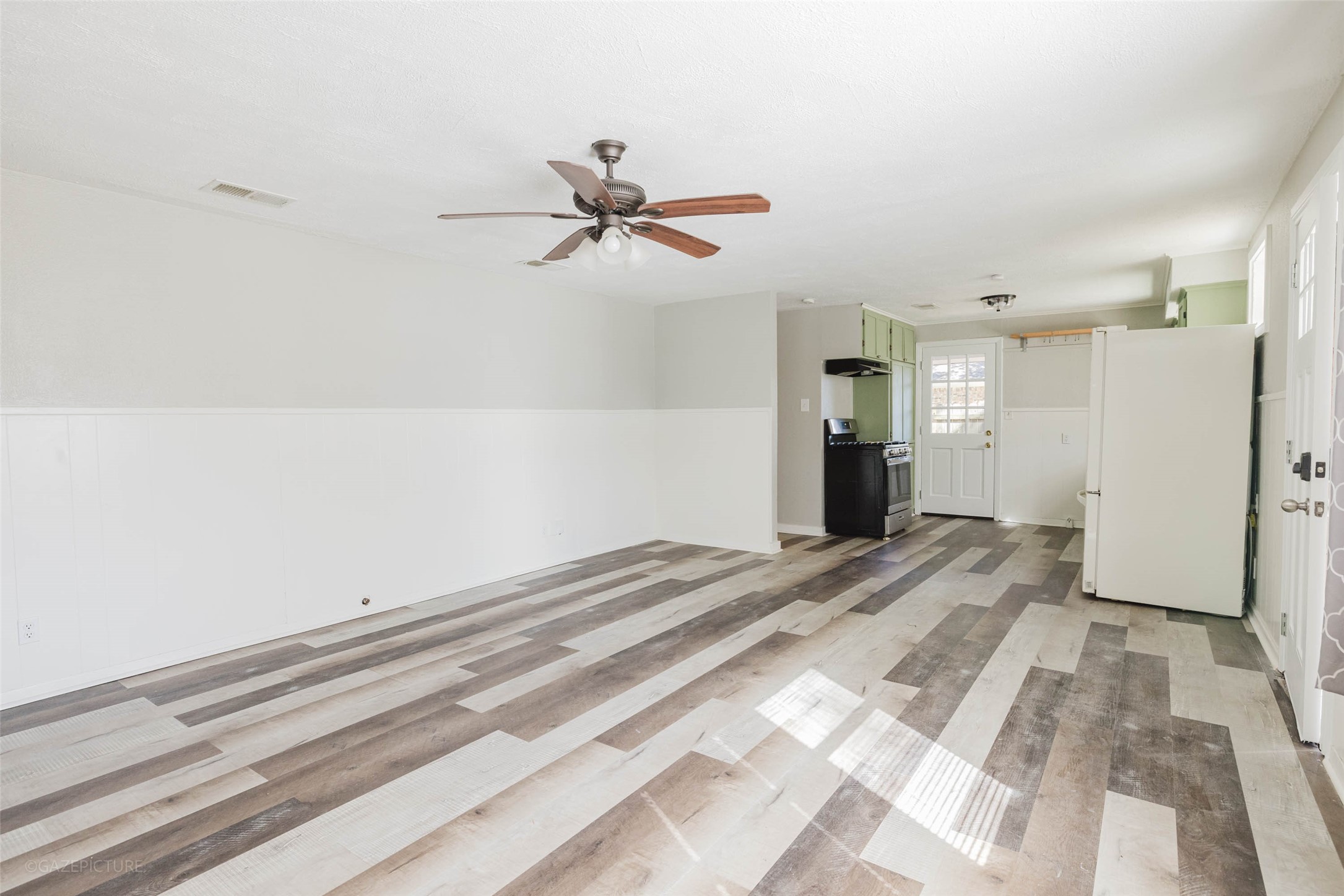 2518 Daugherty Street Waller, TX 77484 - Photo 5 of 32 a view of a room with a ceiling fan