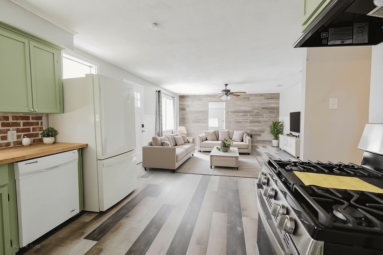 2518 Daugherty Street Waller, TX 77484 - Photo 8 of 32 a kitchen with sink stove and refrigerator