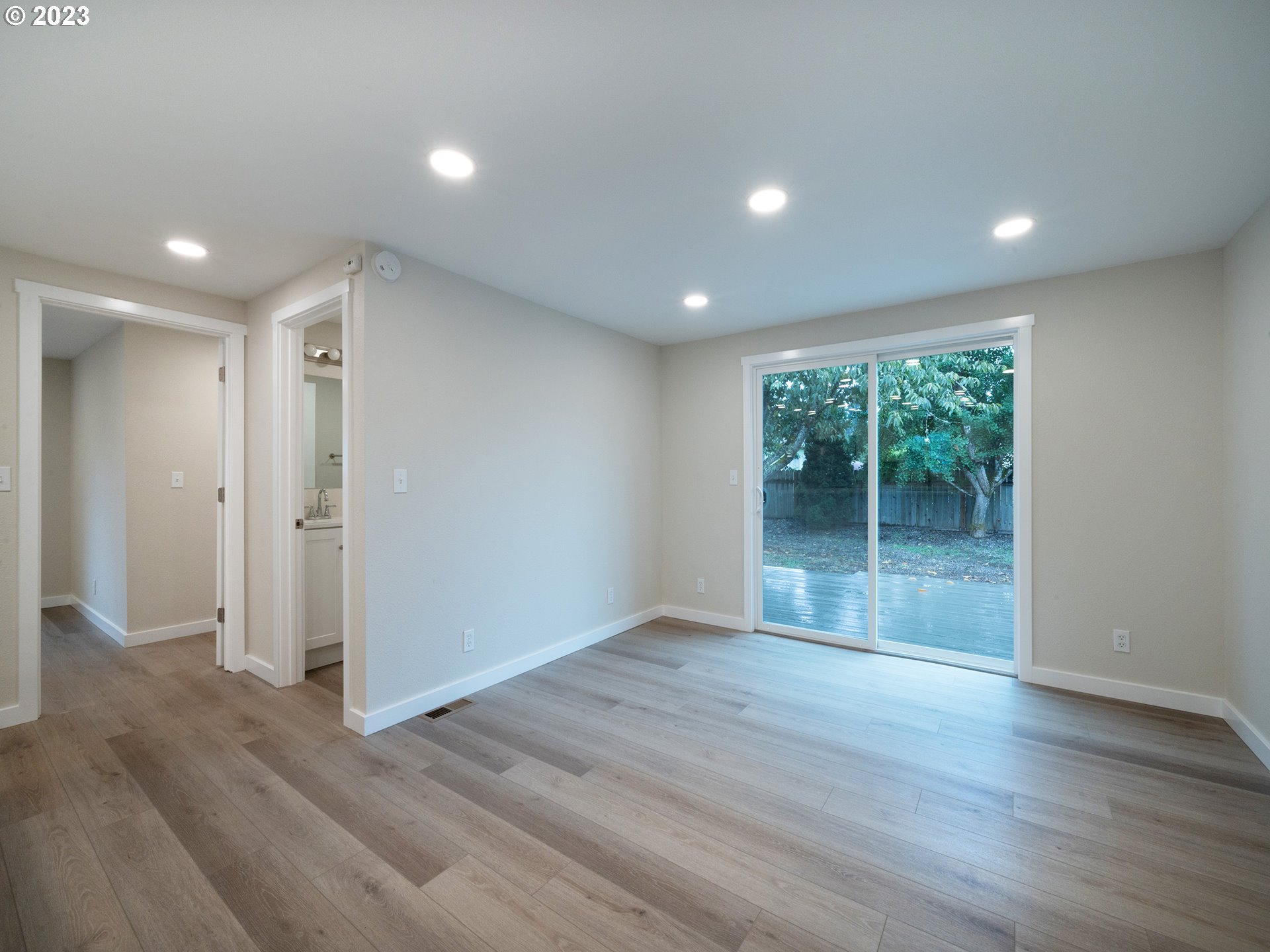 5131 Daisy Street Springfield, OR 97478 - Photo 11 of 45 a view of livingroom with hardwood floor and window