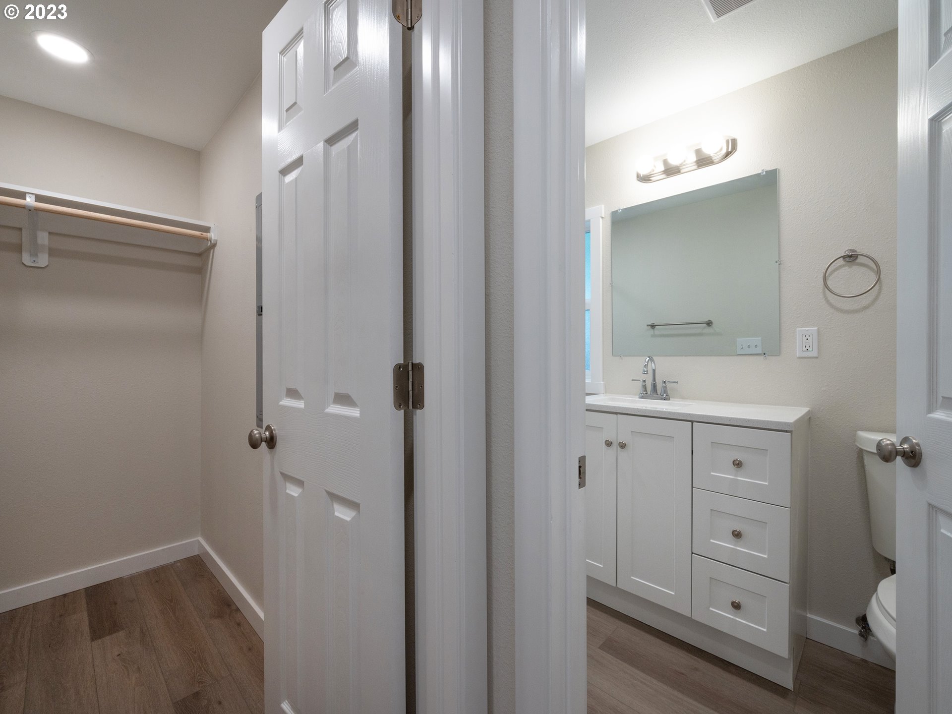 5131 Daisy Street Springfield, OR 97478 - Photo 25 of 45 a bathroom with a sink a light fixture a vanity and a mirror