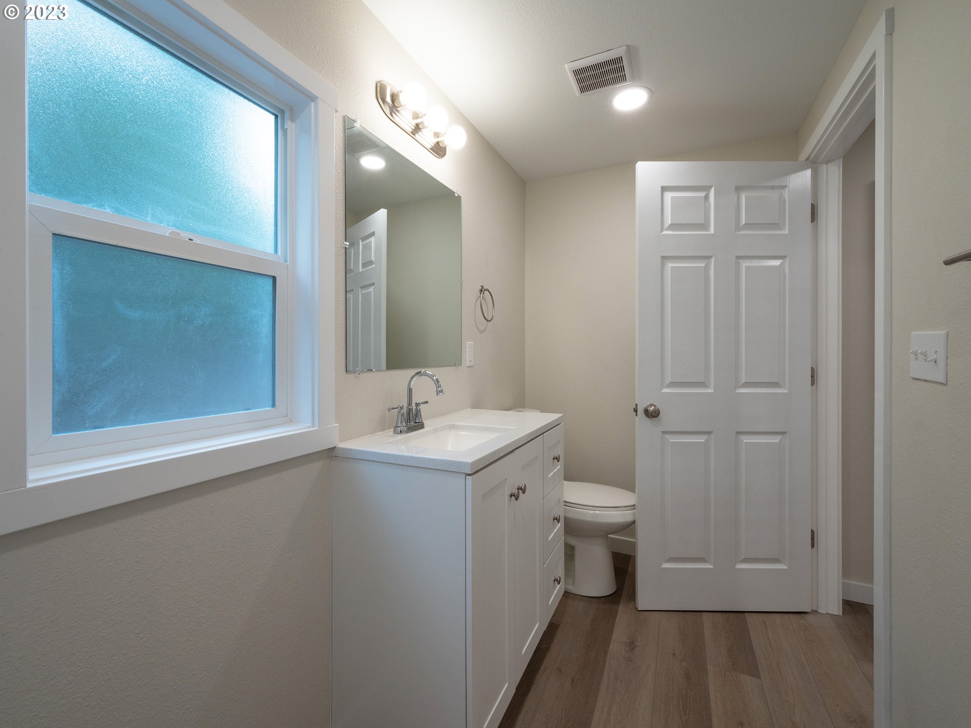 5131 Daisy Street Springfield, OR 97478 - Photo 27 of 45 a bathroom with a sink a toilet and shower