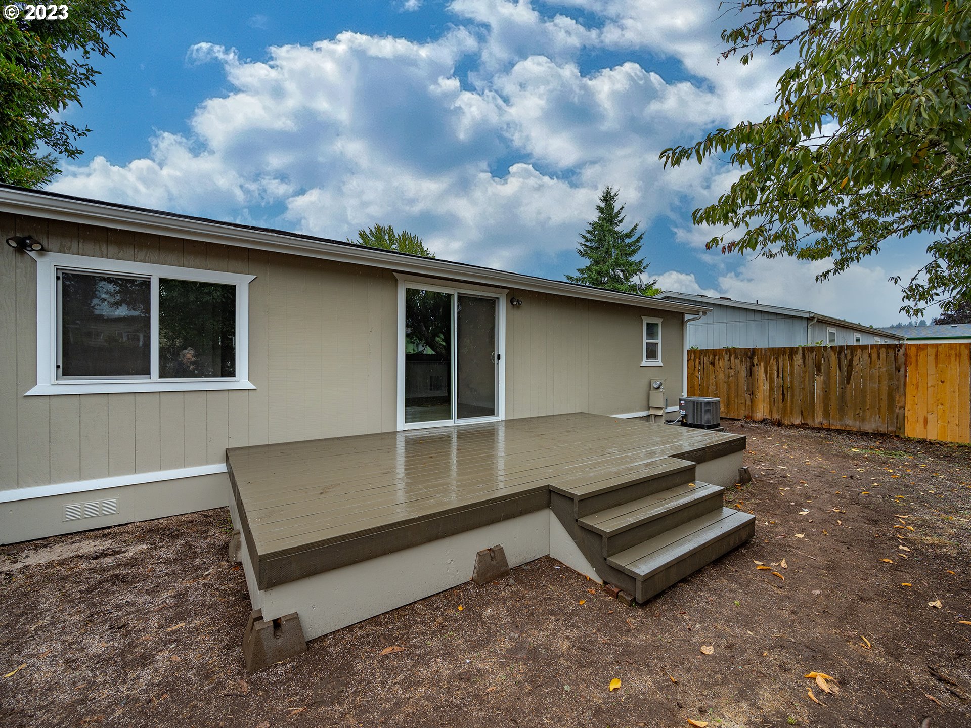 5131 Daisy Street Springfield, OR 97478 - Photo 34 of 45 a backyard of a house with table and chairs