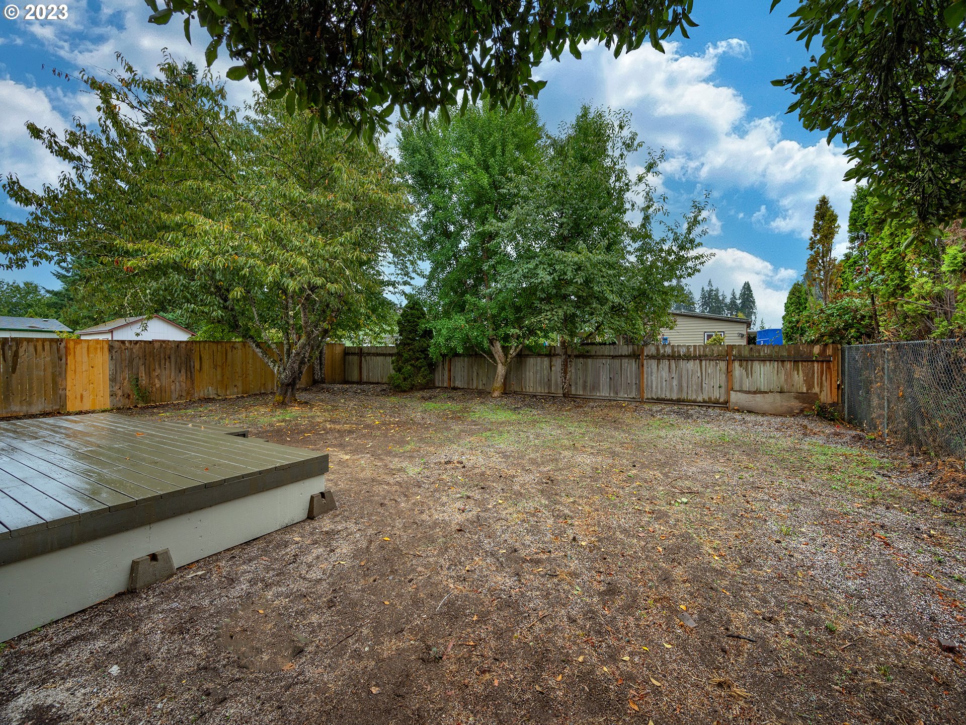 5131 Daisy Street Springfield, OR 97478 - Photo 35 of 45 a view of a backyard with large trees