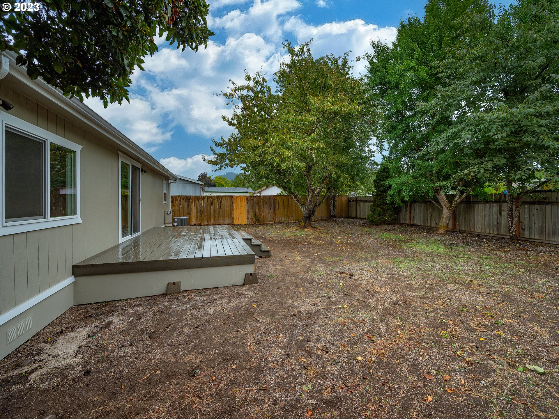 5131 Daisy Street Springfield, OR 97478 - Photo 36 of 45 a front view of a house with a yard