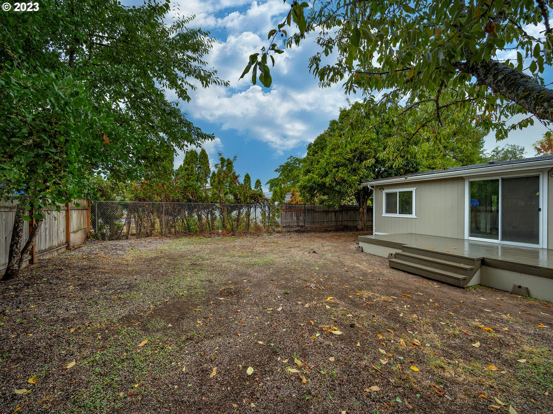 5131 Daisy Street Springfield, OR 97478 - Photo 39 of 45 a view of a backyard with large trees