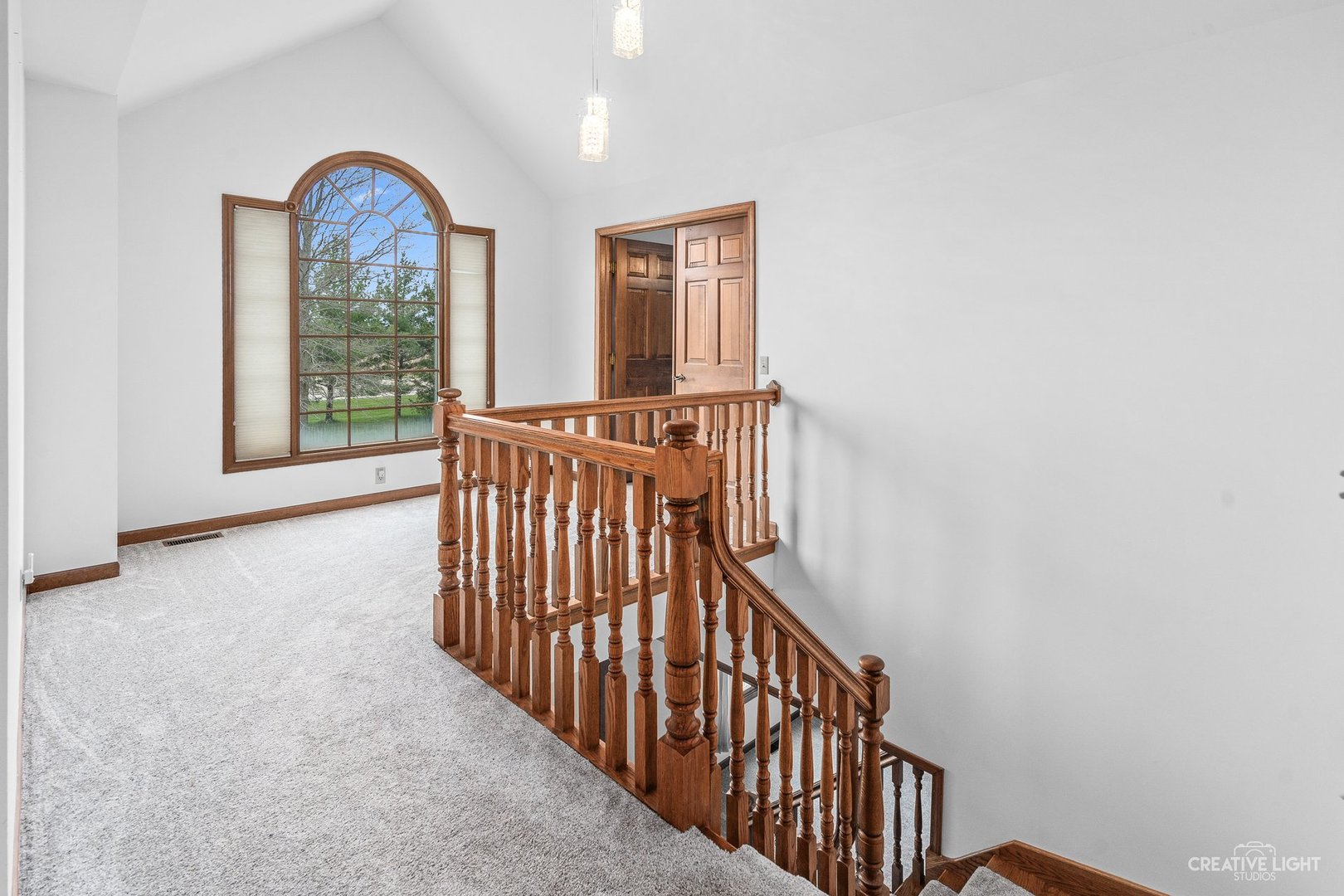 980 Eldamain Road Plano, IL 60545 - Photo 25 of 27 a view interior of a house with wooden floor and windows