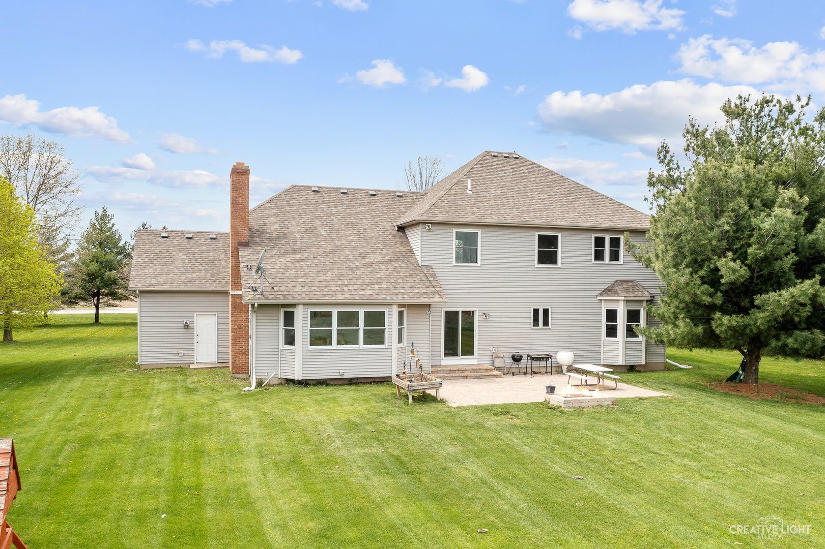 980 Eldamain Road Plano, IL 60545 - Photo 27 of 27 a front view of a house with a yard