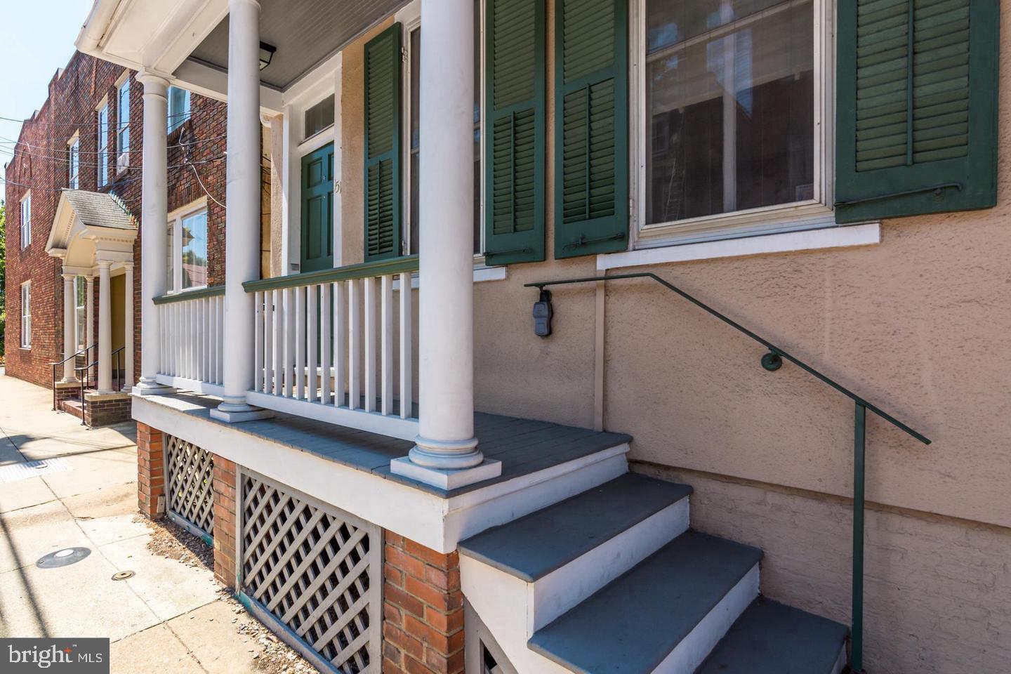 151 Duke Of Gloucester Street Annapolis, MD 21401 - Photo 3 of 28 a view of staircase with a small white door