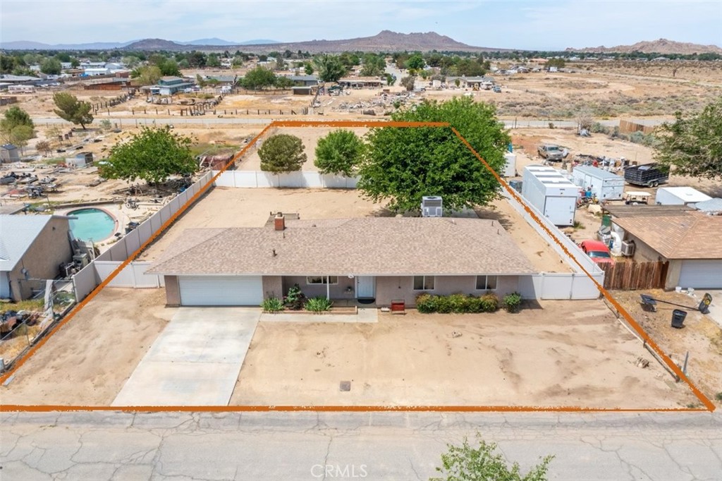 41115 Fieldspring Street Lancaster, CA 93535 - Photo 1 of 1 a view of a swimming pool and an outdoor space