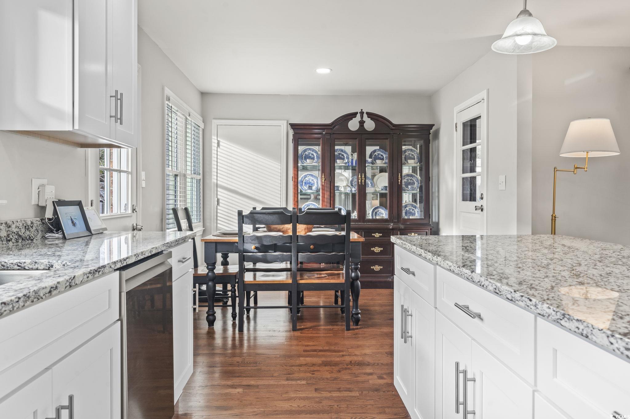 1673 Middleton Street Georgetown, SC 29440 - Photo 14 of 40 Kitchen featuring light stone counters, white cabi