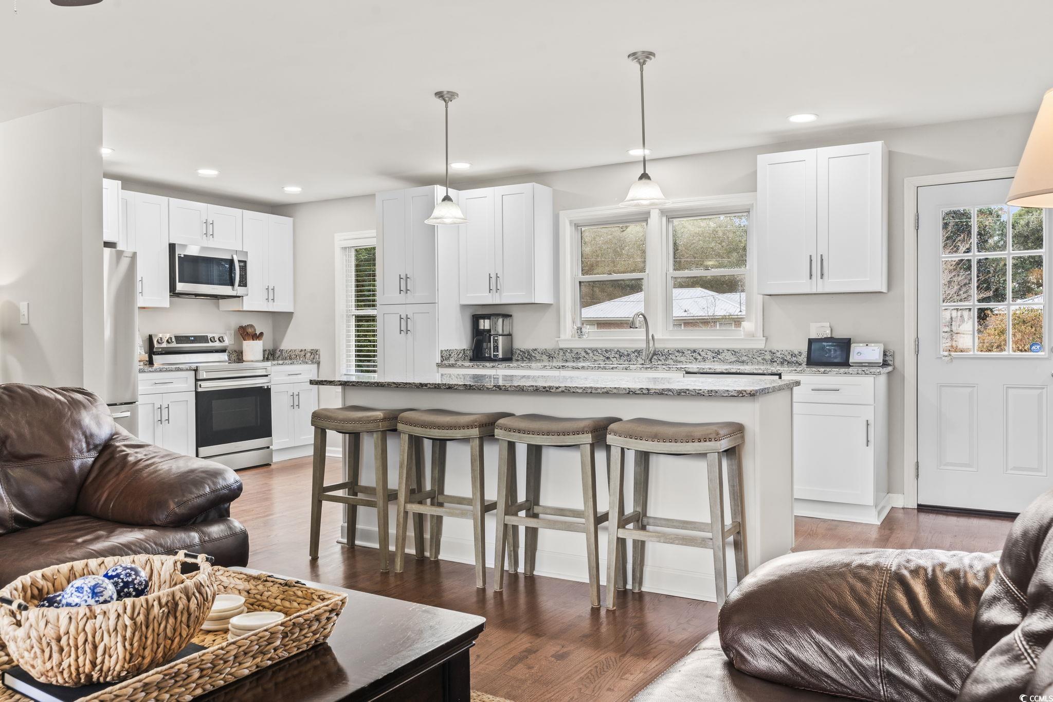 1673 Middleton Street Georgetown, SC 29440 - Photo 19 of 40 Kitchen featuring light stone countertops, applian