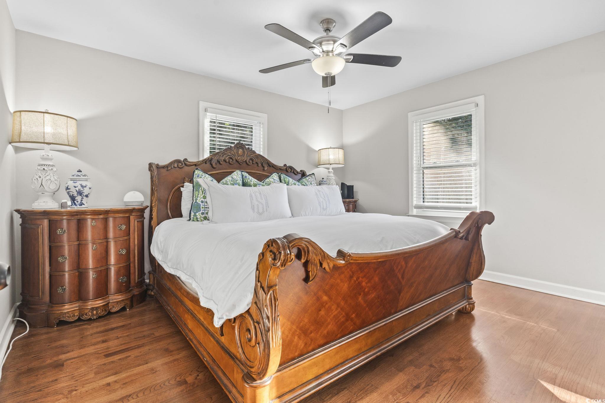 1673 Middleton Street Georgetown, SC 29440 - Photo 22 of 40 Bedroom with ceiling fan and dark hardwood / wood-