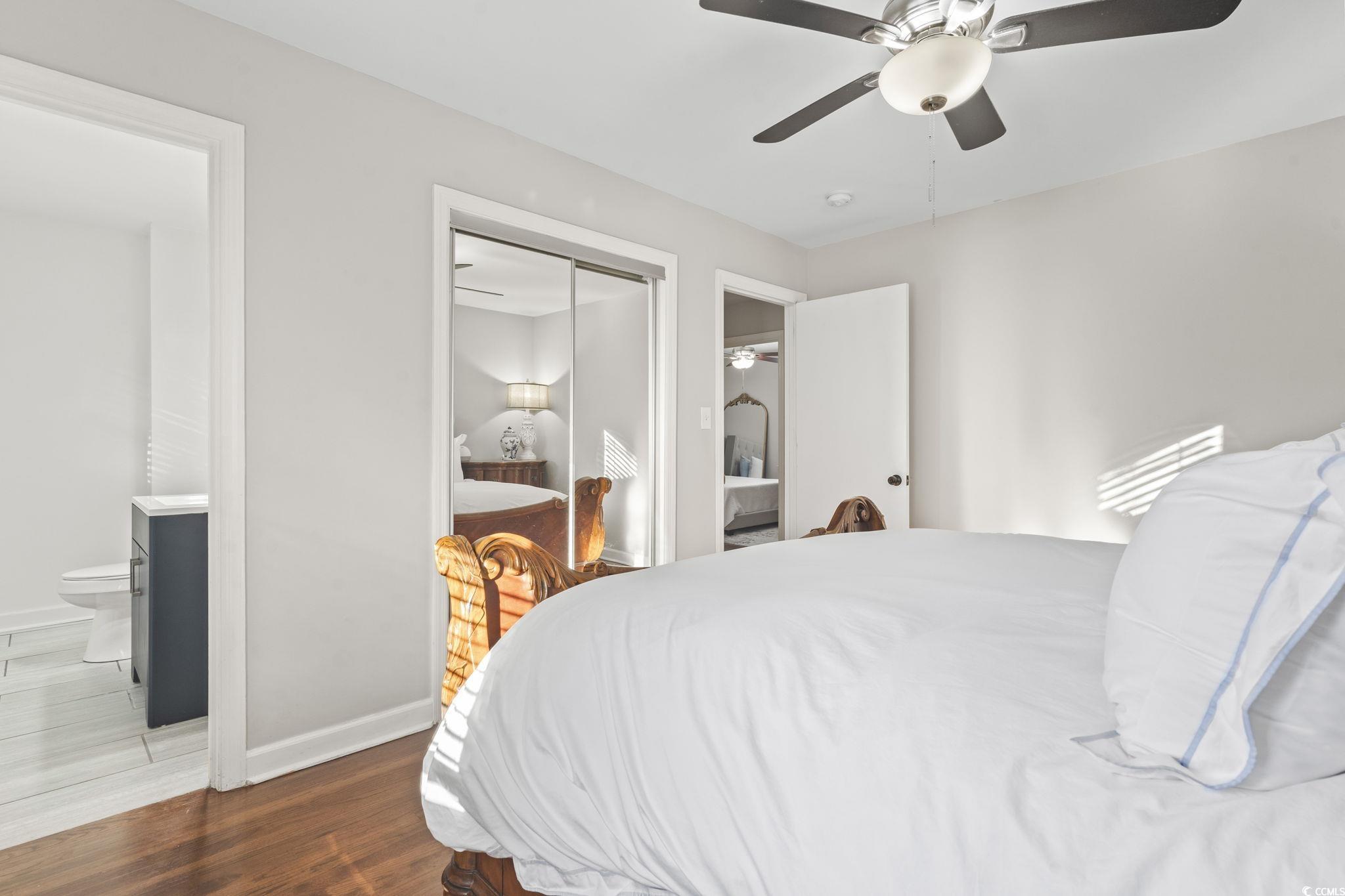 1673 Middleton Street Georgetown, SC 29440 - Photo 23 of 40 Bedroom featuring ceiling fan, ensuite bath, dark