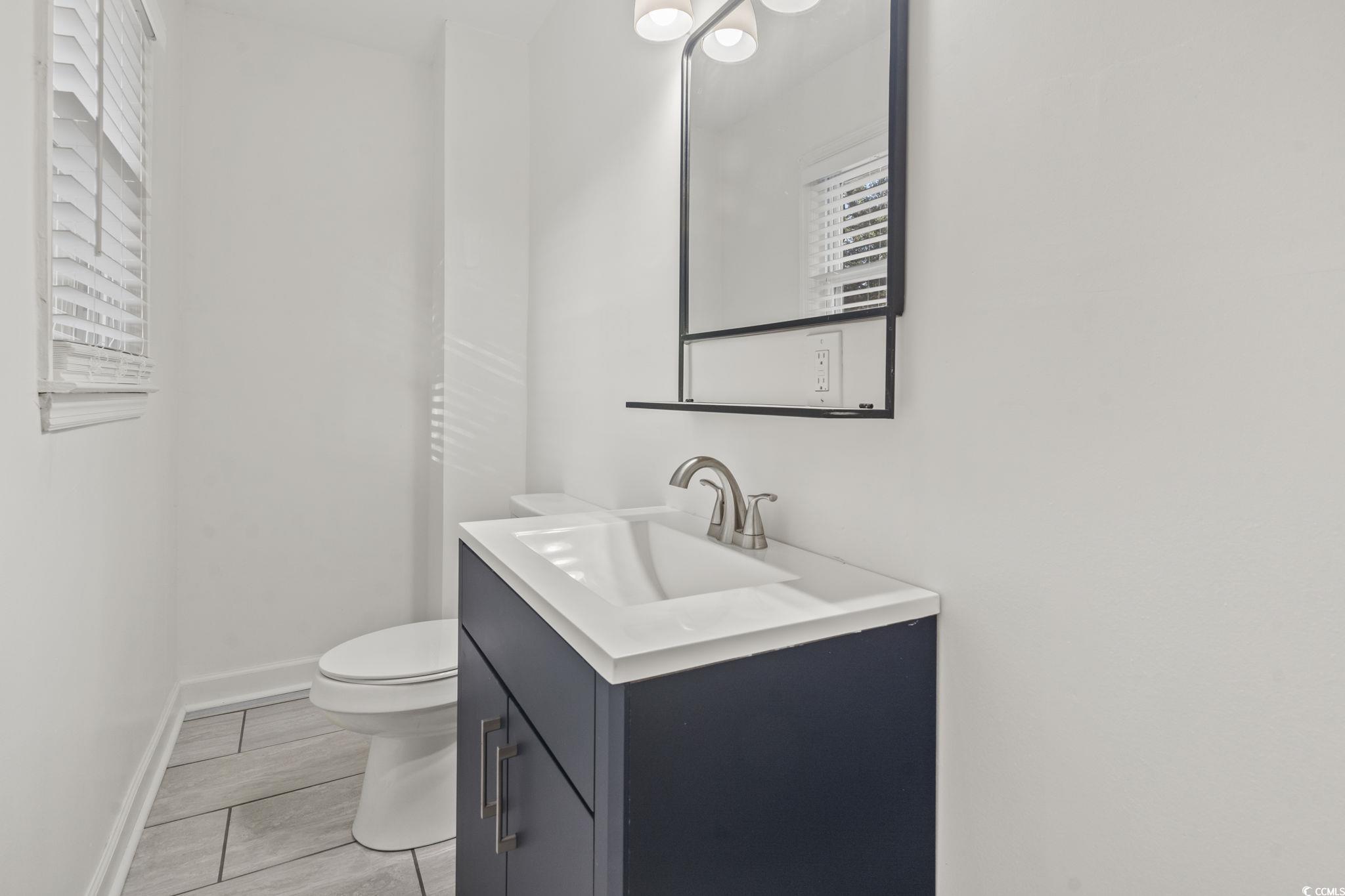 1673 Middleton Street Georgetown, SC 29440 - Photo 24 of 40 Bathroom with vanity and toilet