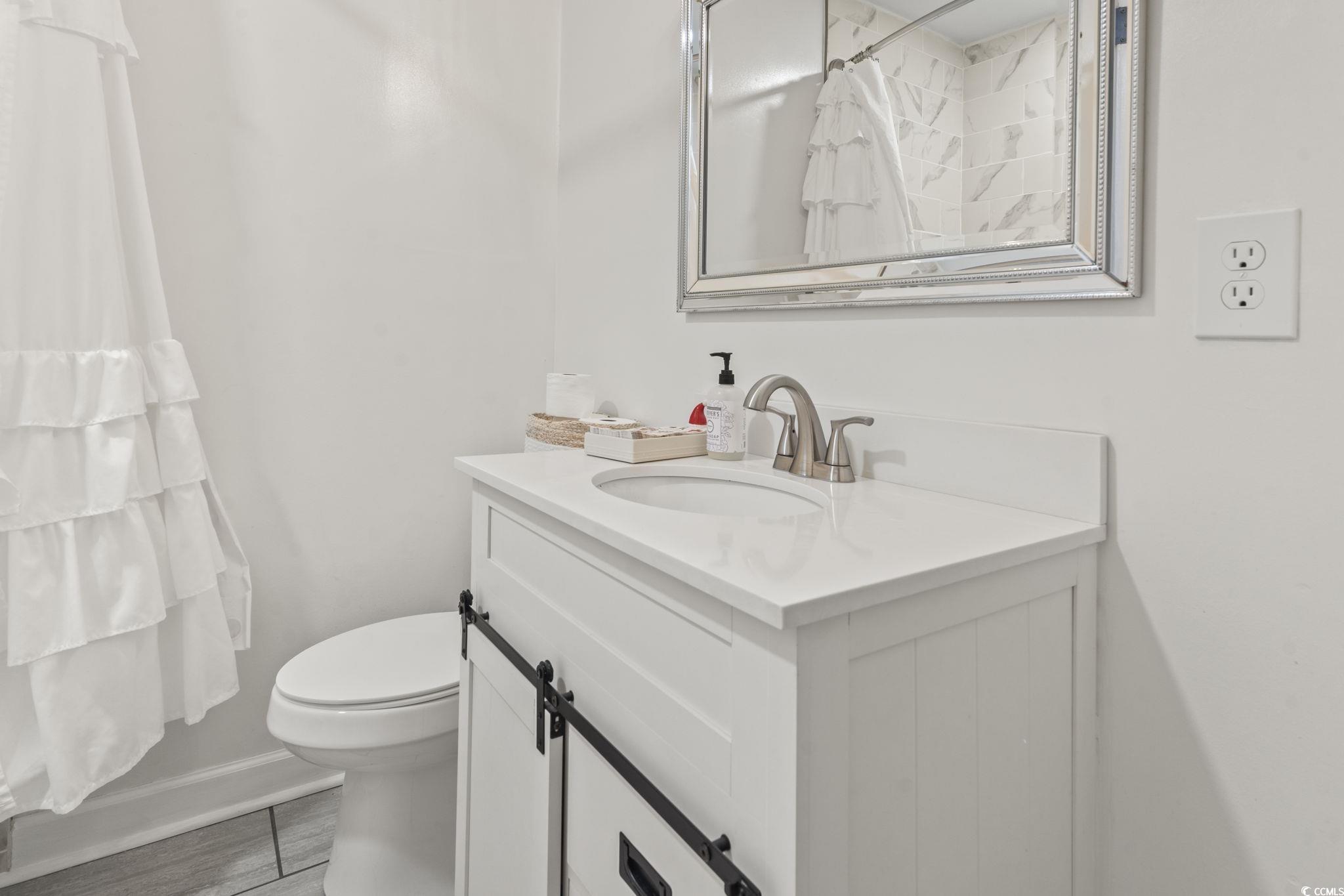 1673 Middleton Street Georgetown, SC 29440 - Photo 26 of 40 Bathroom with vanity and toilet