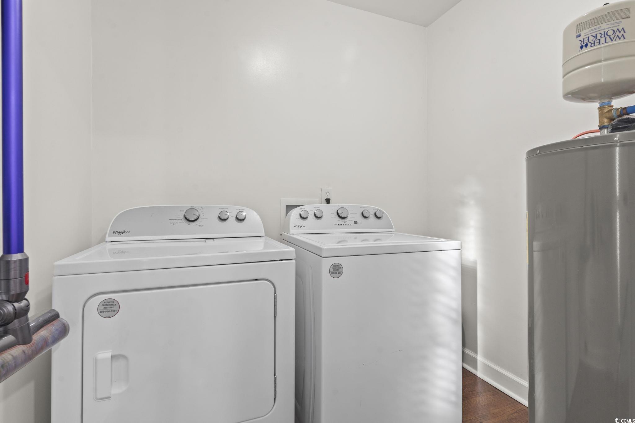 1673 Middleton Street Georgetown, SC 29440 - Photo 28 of 40 Laundry area featuring gas water heater, dark wood