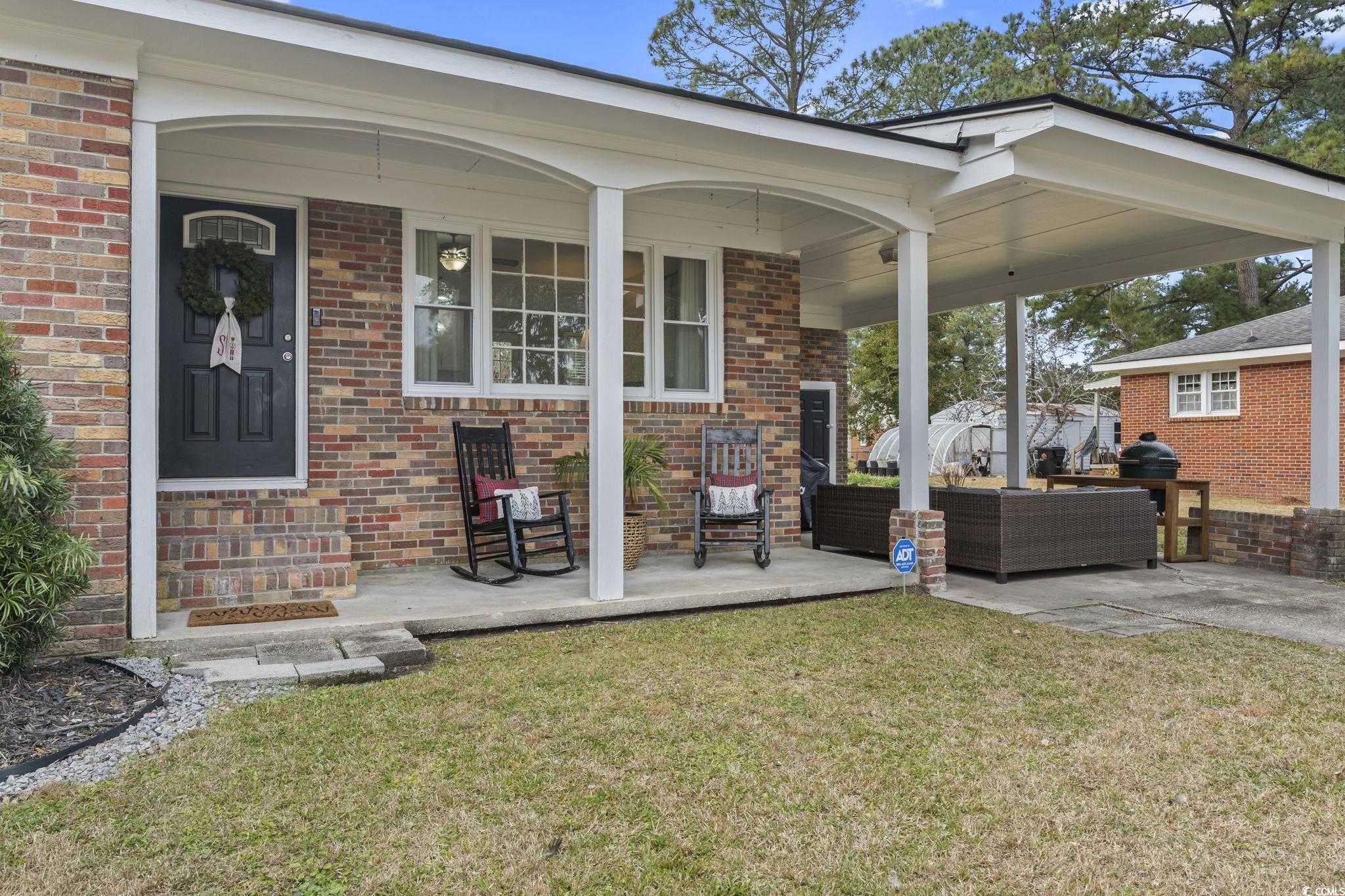 1673 Middleton Street Georgetown, SC 29440 - Photo 33 of 40 View of patio / terrace with a porch and an outdoo