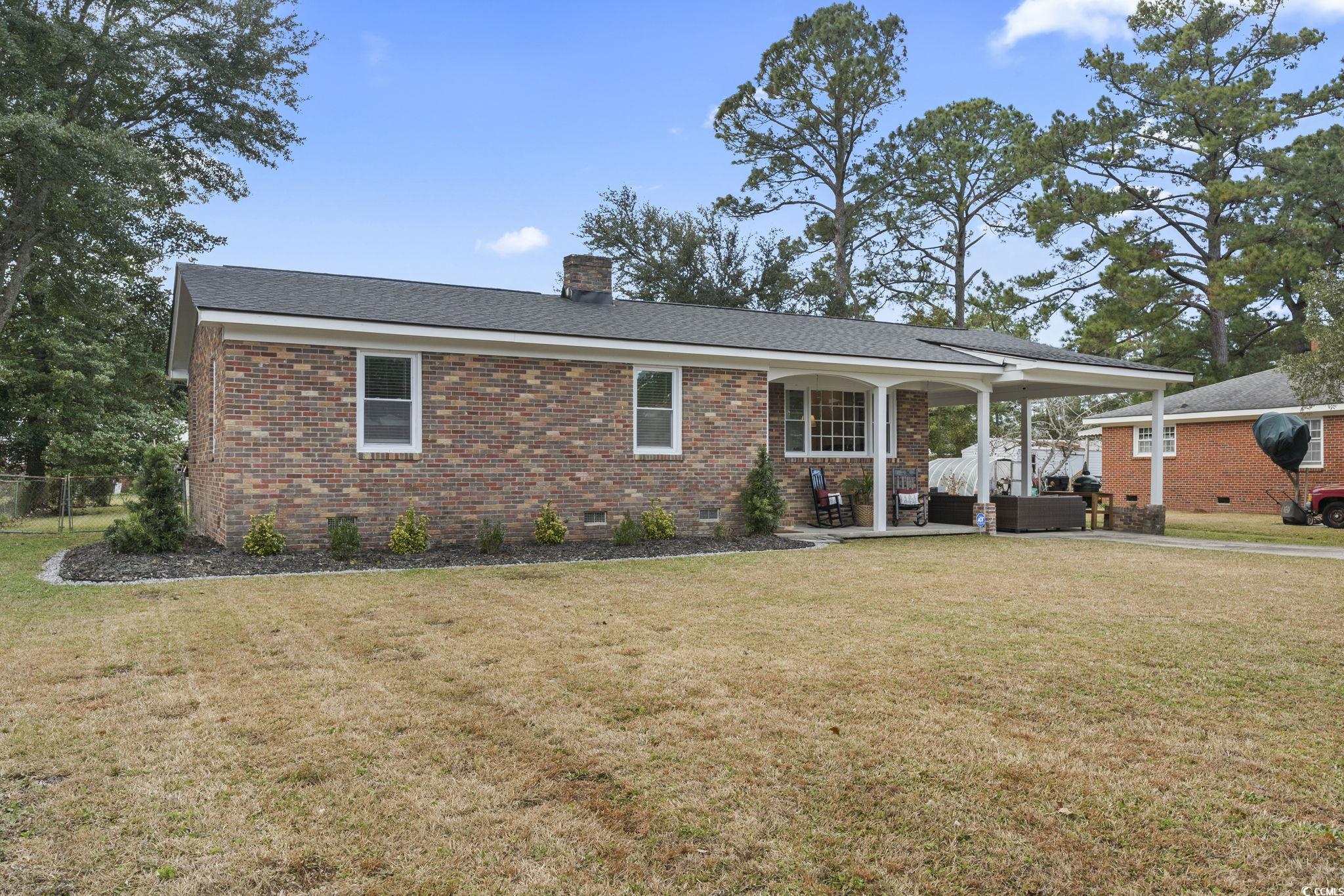 1673 Middleton Street Georgetown, SC 29440 - Photo 34 of 40 View of front of home with an outdoor hangout area