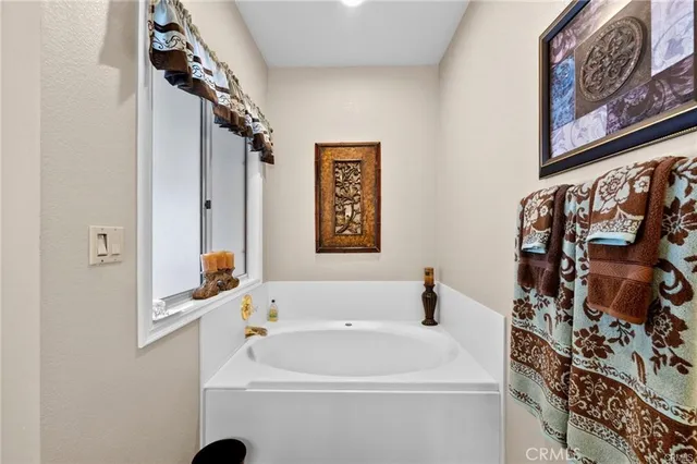 a bathroom with a sink vanity and a mirror