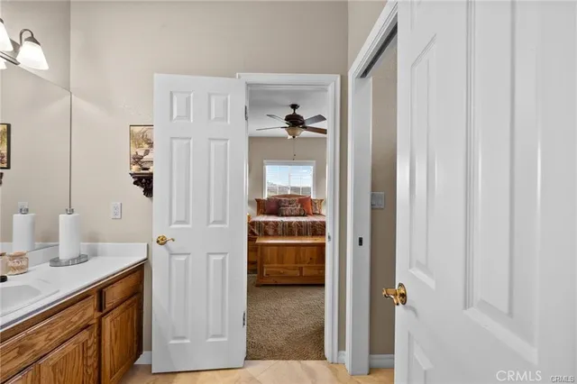 a view of a swimming pool with sitting area