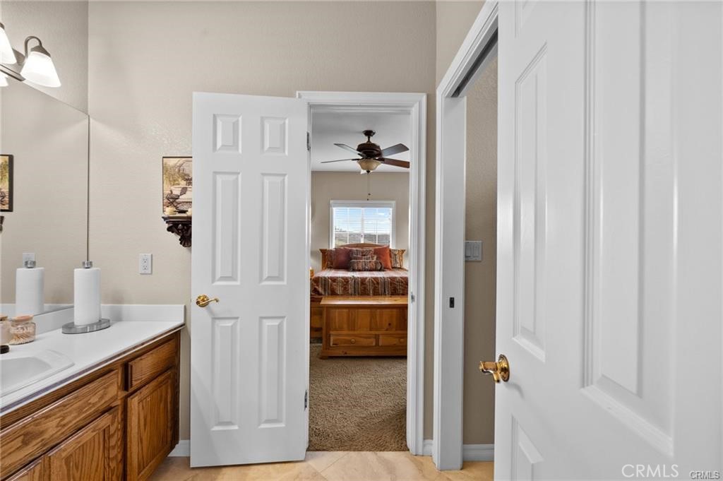 39581 Sperry Court Temecula, CA 92591 - Photo 41 of 63 a en suite bathroom with a shower and a sink