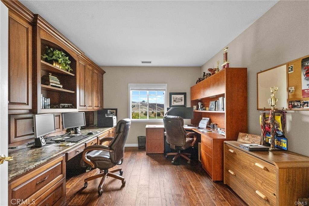 39581 Sperry Court Temecula, CA 92591 - Photo 44 of 63 a view of a workspace with furniture and a window