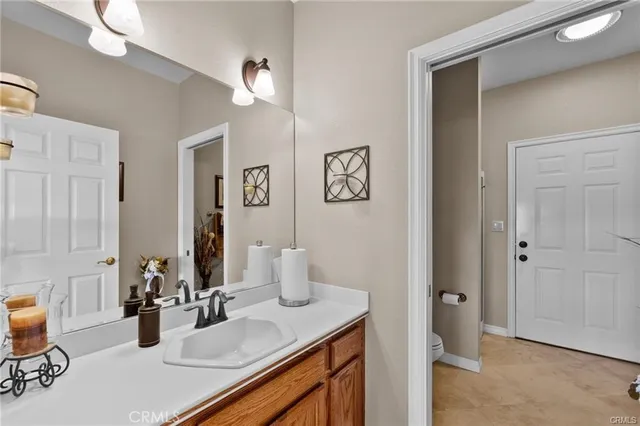 a view of multiple houses with a big yard