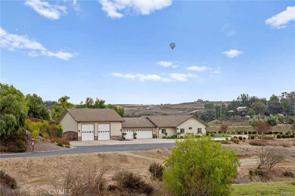39581 Sperry Court Temecula, CA 92591 - Photo 55 of 63 a view of multiple houses with a big yard