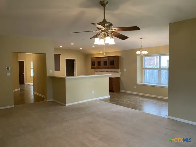 a view of a kitchen with a sink