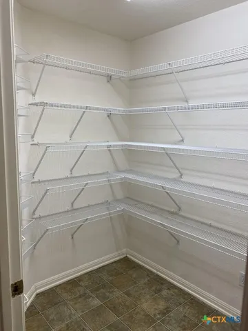 a view of a room with an empty space