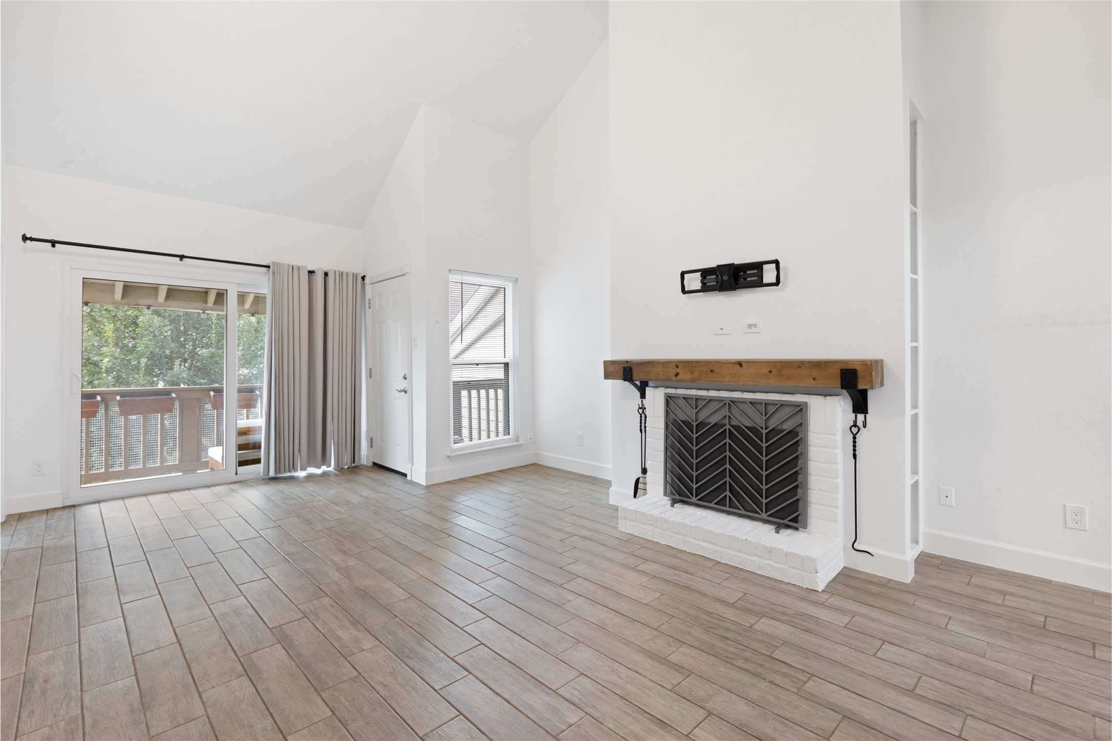 2100 Tanglewilde Street, Unit 378 Houston, TX 77063 - Photo 11 of 25 Because nothing says “Netflix binge” like mounting your TV right over the spot where Santa comes in.